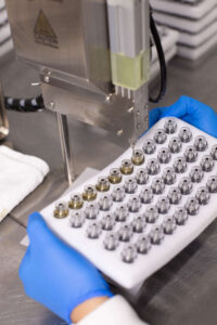 cannabis brands outsourcing production 2026
